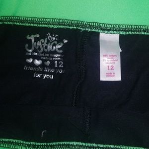 Justice Bottoms - Green and black justice equestrian leggings. Justice Bottoms - Green and black justice equestrian leggings.